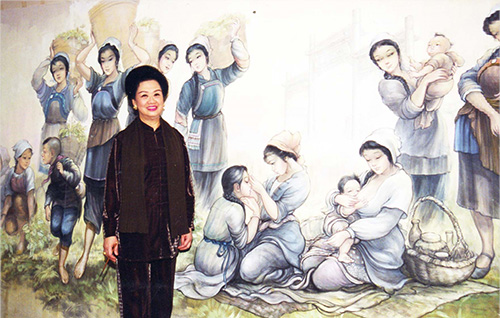29.为香港慈善家王梁洁华制作服装  背景是她的画作.jpg