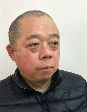 我校77届2班校友谢远明